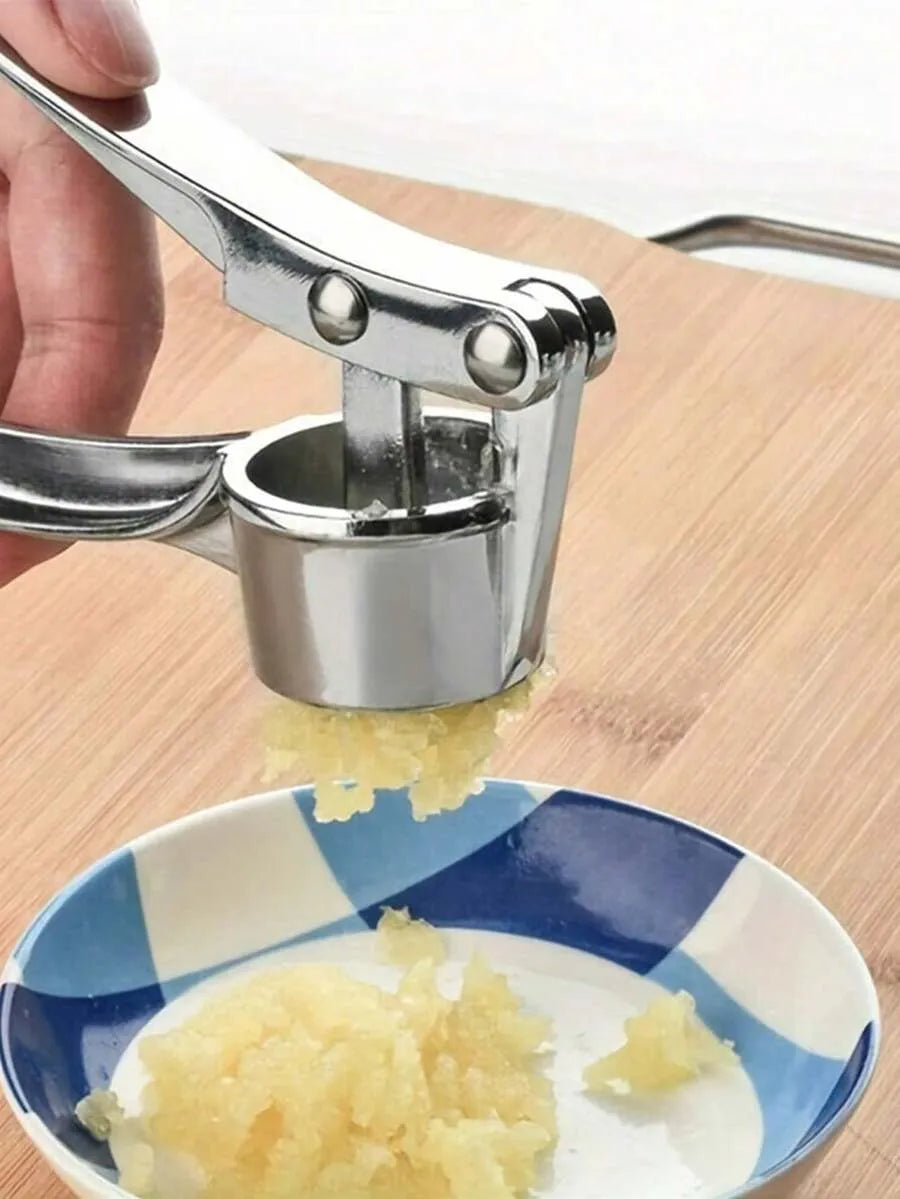1 alloy garlic and ginger press, designed to crush garlic and ginger into a paste. Ideal for food preparation in home kitchens, making condiments in restaurant kitchens, and other uses.